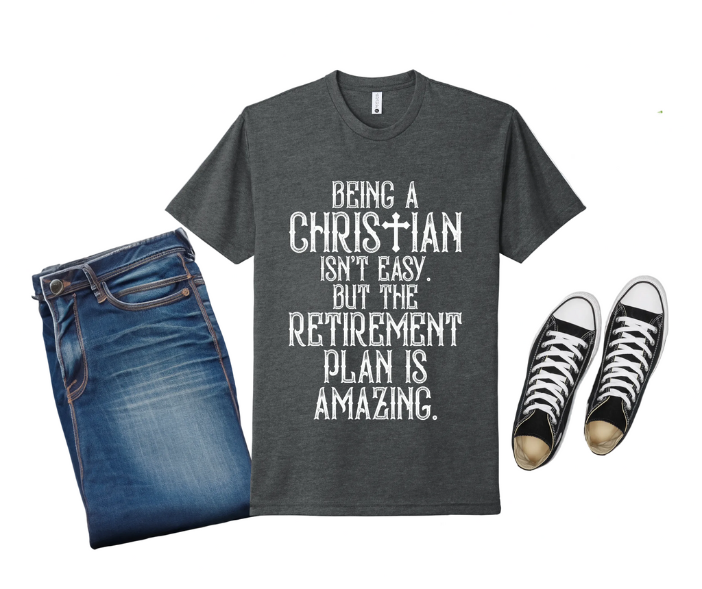 Gray t-shirt with humorous text design, paired with jeans and sneakers on a light gray background.