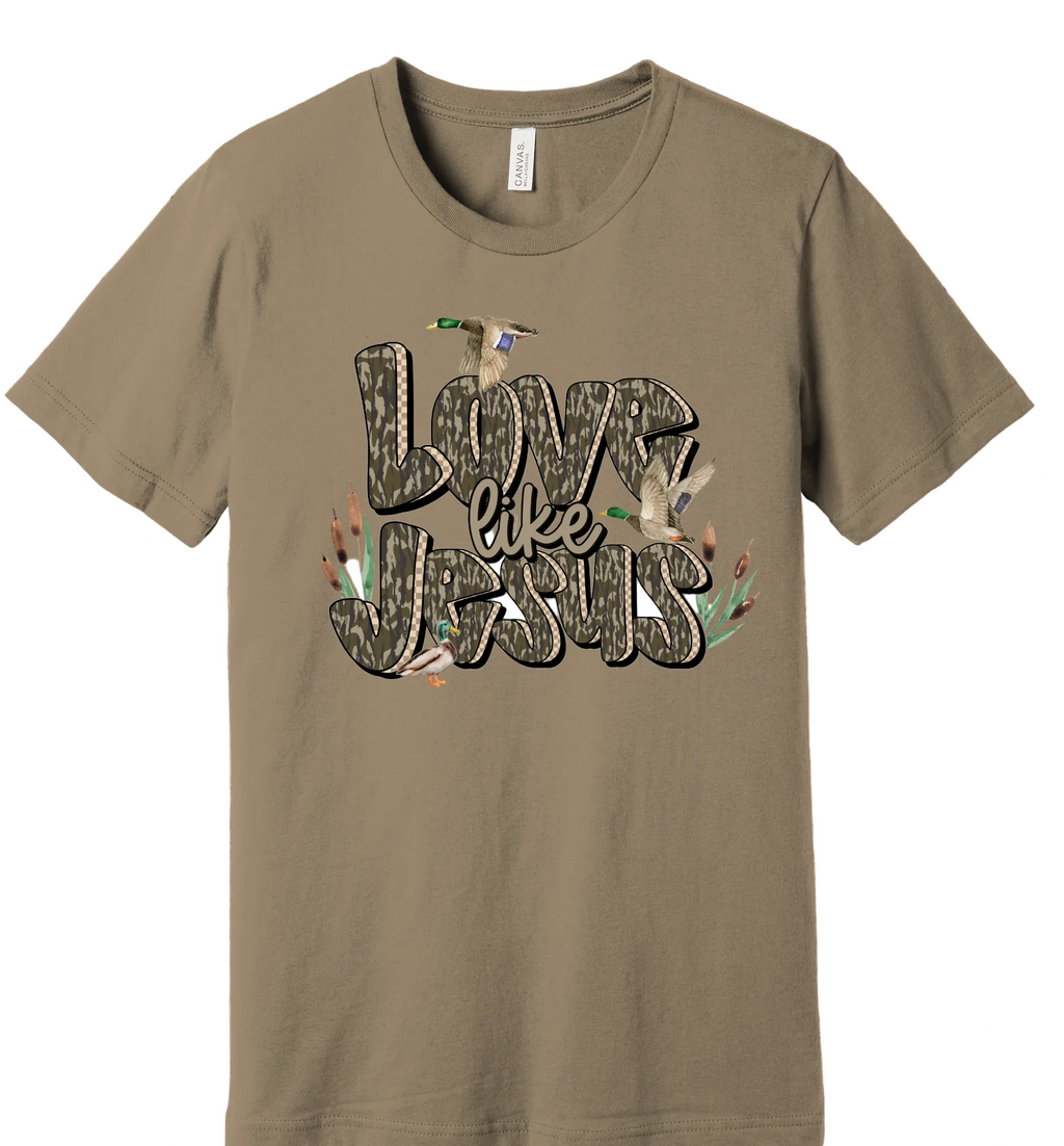 Brown t-shirt with 'Love like Jesus' design on a wooden background
